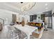Bright dining space with modern lighting, seamlessly connected to the living room and kitchen at 1740 S Gordon Sw St, Atlanta, GA 30310