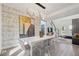 Open dining space featuring a modern chandelier, a nearby staircase, and easy access to living areas at 1740 S Gordon Sw St, Atlanta, GA 30310