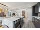 Gourmet kitchen island with stainless steel appliances, seating, and stylish finishes for entertaining at 1740 S Gordon Sw St, Atlanta, GA 30310