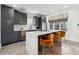 Sleek kitchen with grey cabinetry, stainless steel appliances, and a large island with barstool seating at 1740 S Gordon Sw St, Atlanta, GA 30310