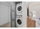 Laundry closet with stacked washer and dryer are conveniently located near the living area at 1740 S Gordon Sw St, Atlanta, GA 30310