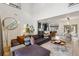 Open floor plan living space with views to the kitchen and dining area, hardwood floors, and modern decor at 1740 S Gordon Sw St, Atlanta, GA 30310