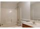 Functional bathroom with a shower-tub combo, neutral walls and vanity at 180 Jay Trl, Fayetteville, GA 30215