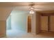 Large bedroom with closets and doorway to other rooms of the house at 180 Jay Trl, Fayetteville, GA 30215