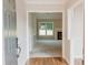 Inviting living room with neutral walls and a fireplace, offering a cozy atmosphere at 180 Jay Trl, Fayetteville, GA 30215