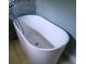 Bathroom with a freestanding tub and modern fixtures at 3072 Will Rogers Se Pl, Atlanta, GA 30316