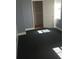 Bedroom with grey walls, carpeted floors, and natural light from a window at 3072 Will Rogers Se Pl, Atlanta, GA 30316