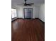 Bright living room featuring hardwood floors, white walls and large windows at 3072 Will Rogers Se Pl, Atlanta, GA 30316