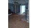 Spacious living room with a fireplace and doorway to another room at 3072 Will Rogers Se Pl, Atlanta, GA 30316
