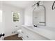 Bathroom featuring a sink with white cabinets and modern black hardware at 464 Rockborough Ter, Stone Mountain, GA 30083