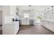 Updated kitchen with stainless steel appliances and subway tile backsplash at 464 Rockborough Ter, Stone Mountain, GA 30083