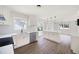 Renovated kitchen with stainless steel appliances and ample natural light at 464 Rockborough Ter, Stone Mountain, GA 30083