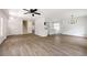 Open-concept living room with hardwood floors, and lots of natural light at 464 Rockborough Ter, Stone Mountain, GA 30083