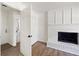 Cozy living room featuring fireplace and doorway to a bathroom at 464 Rockborough Ter, Stone Mountain, GA 30083
