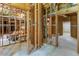 Unfinished basement area with exposed wood framing, duct work, and concrete flooring at 2709 Gentry Dr, Douglasville, GA 30135
