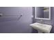 Charming powder room with pedestal sink and classic mirror at 2709 Gentry Dr, Douglasville, GA 30135