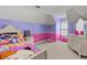 Cozy bedroom with two-tone walls, a playful design, and a comfortable sleeping space at 2709 Gentry Dr, Douglasville, GA 30135