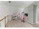 Bright bonus room features a built-in bookshelf, desk, and lots of natural light at 2709 Gentry Dr, Douglasville, GA 30135
