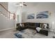 Inviting living room area with cozy sectional sofa and stylish accents at 2709 Gentry Dr, Douglasville, GA 30135