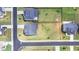 Aerial view showcasing home's position on a peaceful street at 3695 Andover St, Cumming, GA 30028