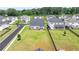 Aerial view of the house, neighborhood, ample green space and surrounding area at 3695 Andover St, Cumming, GA 30028