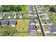 Aerial view of a house with an empty lot in backyard, surrounded by other houses in a peaceful neighborhood at 3695 Andover St, Cumming, GA 30028