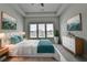 Bright bedroom with a comfortable bed, modern décor, and large windows at 3695 Andover St, Cumming, GA 30028