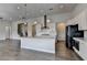 Bright kitchen featuring stainless steel appliances, a large island, and pendant lighting at 3695 Andover St, Cumming, GA 30028