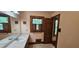 Bathroom offers large mirror, good lighting and large counterspace at 4055 Haralson Mill Ne Rd, Conyers, GA 30012