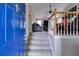 Open foyer with a staircase leading to the living area and hardwood flooring at 169 Knights Ct, Dallas, GA 30157