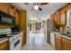 Bright and spacious kitchen featuring a full suite of appliances and linoleum flooring at 169 Knights Ct, Dallas, GA 30157