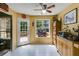 Charming breakfast nook featuring light cabinets, a large window, and access to the back deck at 169 Knights Ct, Dallas, GA 30157