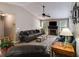 Bright, spacious living room with a stone fireplace, vaulted ceiling, and large windows at 169 Knights Ct, Dallas, GA 30157
