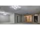 Large basement with neutral walls and carpeted floors, offering potential for various uses at 490 Grand Teton Cir, Fayetteville, GA 30215