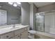 Bathroom featuring vanity and glass shower doors at 490 Grand Teton Cir, Fayetteville, GA 30215