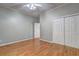 Bedroom with hardwood floors, double closets and a ceiling fan at 490 Grand Teton Cir, Fayetteville, GA 30215