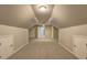 Attic bonus room with neutral walls, carpet floors, and built-in storage at 490 Grand Teton Cir, Fayetteville, GA 30215