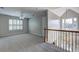 Upstairs bonus room featuring plush carpet, neutral walls, and lots of natural light at 490 Grand Teton Cir, Fayetteville, GA 30215