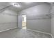 Spacious walk-in closet featuring carpet, custom shelving, and access to the bathroom at 490 Grand Teton Cir, Fayetteville, GA 30215