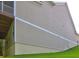 Exterior view of the home with beige siding and backyard greenery at 490 Grand Teton Cir, Fayetteville, GA 30215