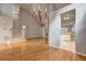 Open-concept living room with hardwood floors, high ceilings, and a staircase at 490 Grand Teton Cir, Fayetteville, GA 30215