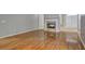 Open living room with fireplace and hardwood floors at 490 Grand Teton Cir, Fayetteville, GA 30215