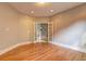 Office with hardwood floors and French doors leading to the main staircase at 490 Grand Teton Cir, Fayetteville, GA 30215