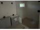 Bathroom under construction with dual vanity, shower and white walls at 7 Charleston Se Ave, Atlanta, GA 30315