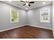 Corner bedroom offers natural light and hardwood floors at 1441 Monteel Nw Dr, Atlanta, GA 30318
