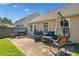 Backyard patio with grill and outdoor seating, perfect for relaxation and barbecues at 137 Hidden Lake Cir, Canton, GA 30114