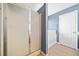 Shower and bath area with accessibility features at 137 Hidden Lake Cir, Canton, GA 30114