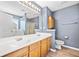 Bathroom featuring double sinks, walk in shower, and a bathtub at 137 Hidden Lake Cir, Canton, GA 30114