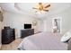 Spacious bedroom featuring neutral paint colors and tray ceilings at 137 Hidden Lake Cir, Canton, GA 30114