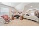 Large bedroom/flex space with desk, bed, and carpet at 137 Hidden Lake Cir, Canton, GA 30114